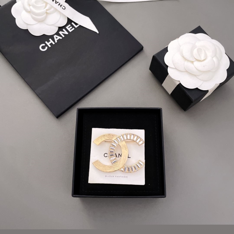 Ch*el brooches